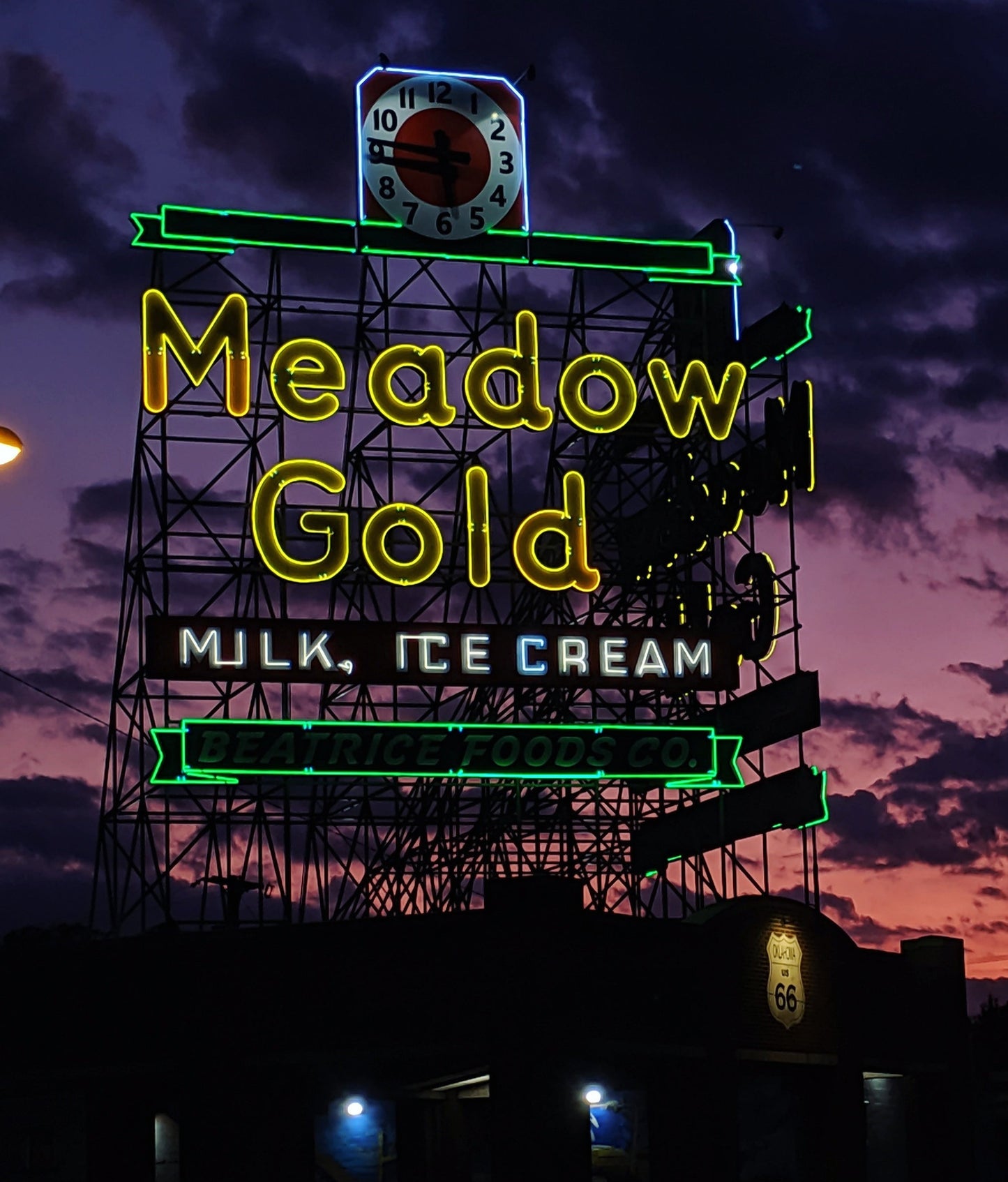 Route 66 Meadow Gold Neon Sign at Sunset photographic print